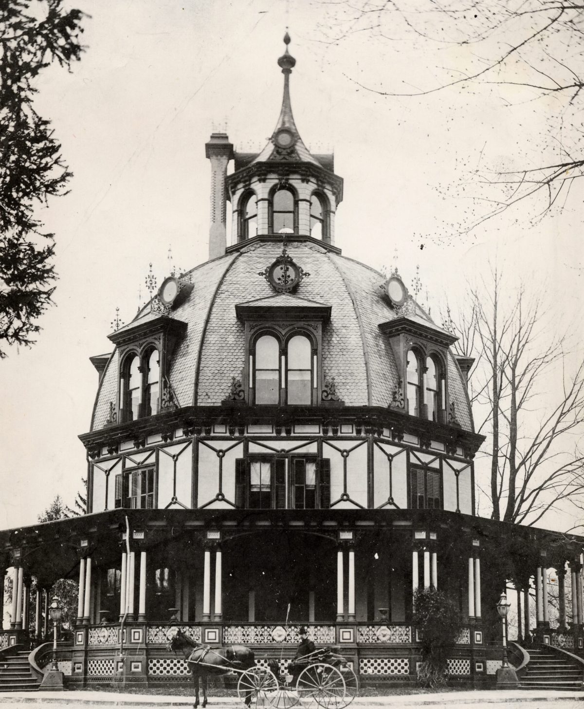 1882-octagon A black and white photo of a four-story building with a domed roof