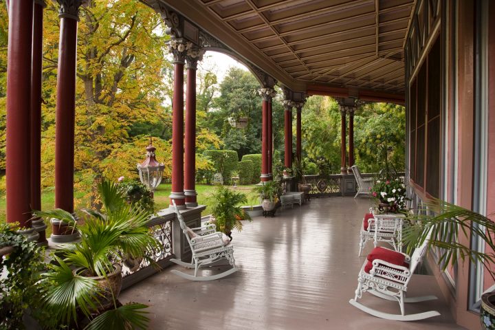 a chair sitting in front of a building