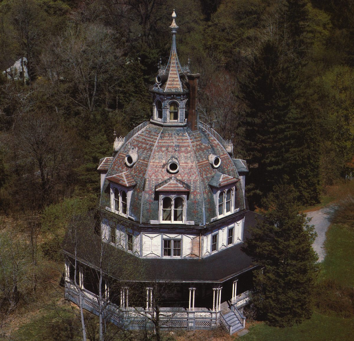 Scan19802 An aerial image of an octagonal house with a domed roof in severe disrepair